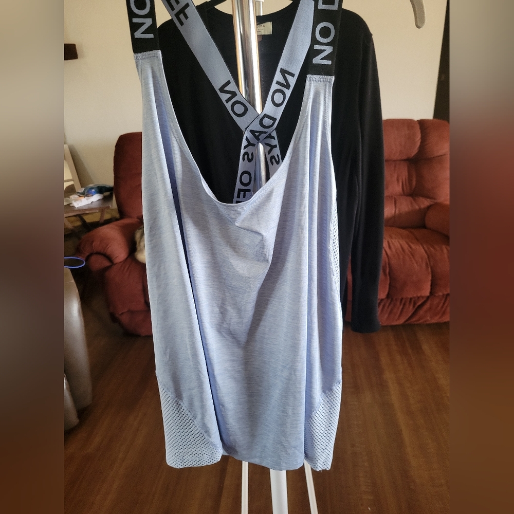 Stylish Light Blue Tank Top with Graphic Straps